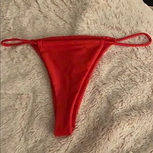 RED BIKINI BOTTOMS SIZE SMALL